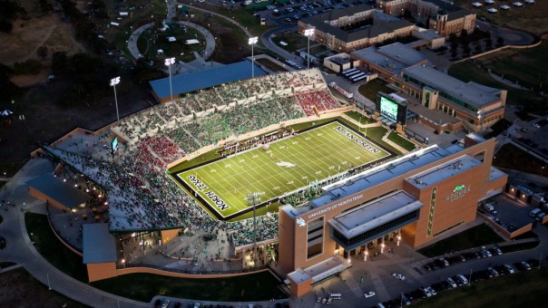 Aerial photo of UNT, University of North Texas Apogee stadium on opening night of a mean green football game at twilight. Taken from a helicopters of or Denton airport with special TFR clearance.
Created: 9/10/11 7:54:26 PM
Camera: Canon Canon EOS 5D Mark II
Focal Length: 45 mm
Settings: ¹⁄₄₀₀ sec at ƒ / 2.8, ISO 1600
Copyright: DTX Media, LLC.
Tags: aerial, structural, real-estate, architecture, exterior.
Original Filename: apogeeopener_0074.jpg