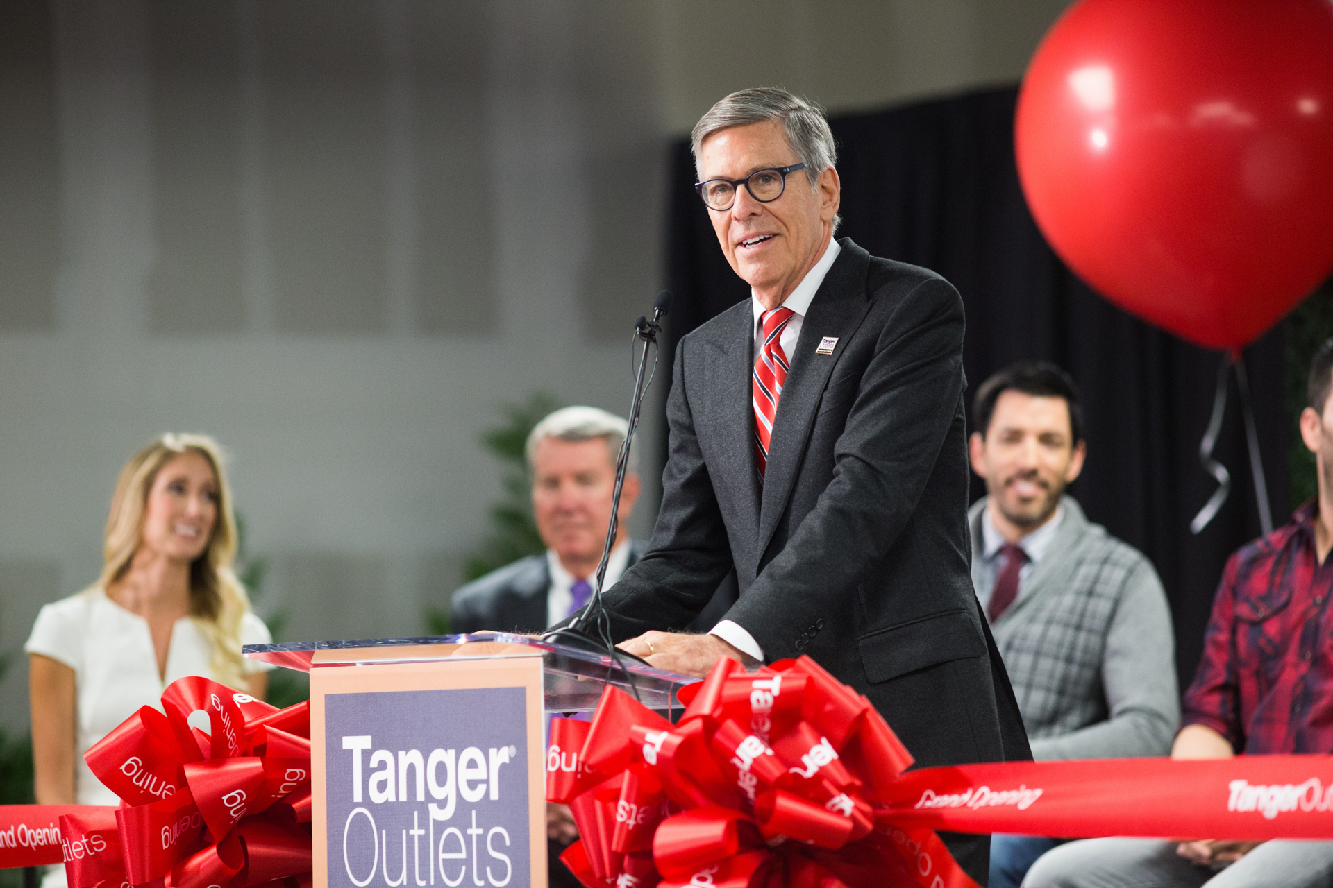A man talking at the grand opening of the Tanger Outlets in Fort Worth Texas. Dallas event video